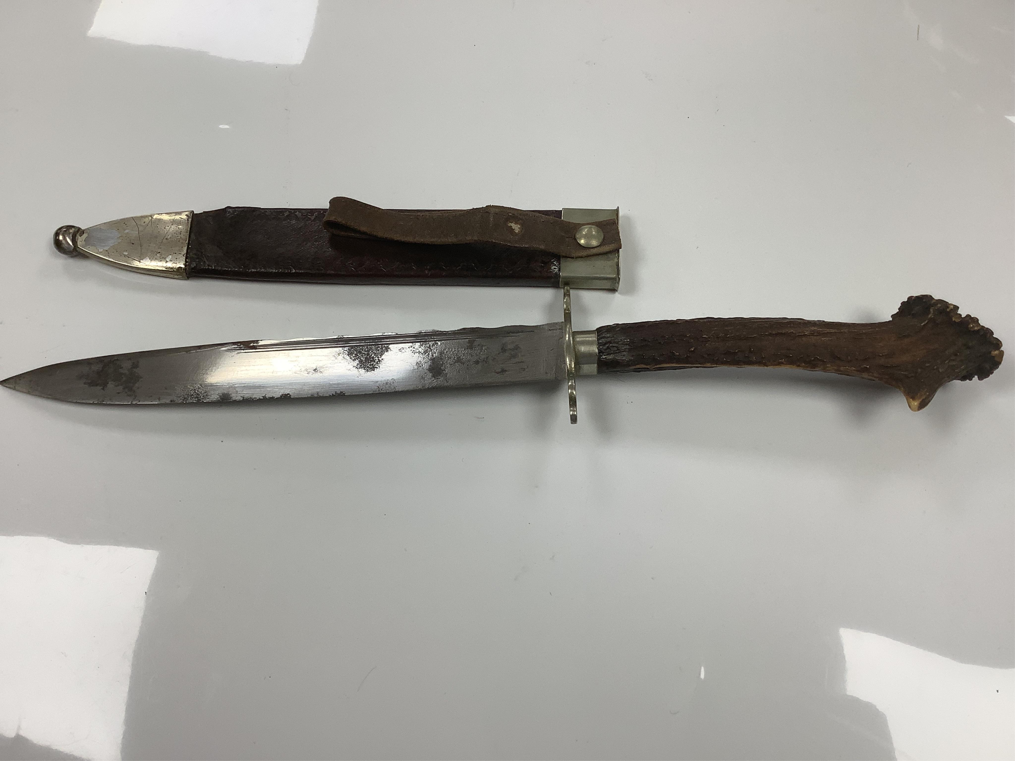 A staghorn handled Bowie knife, the blade stamped Joseph Rodgers and sons, cutlers to their Majesties, Norfolk Street, Sheffield